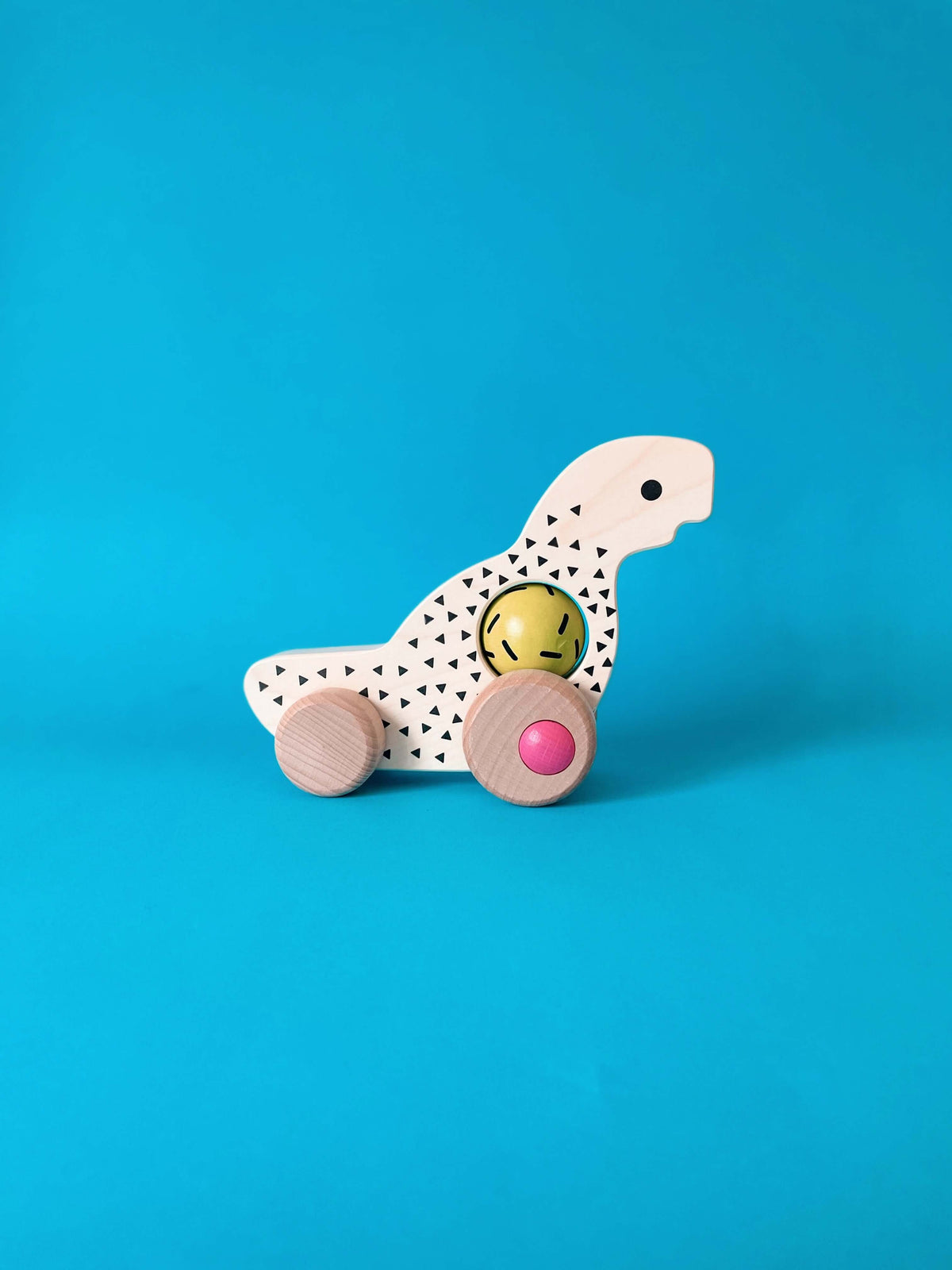 Дървена детска играчка Динозавър с колелца - BAJO