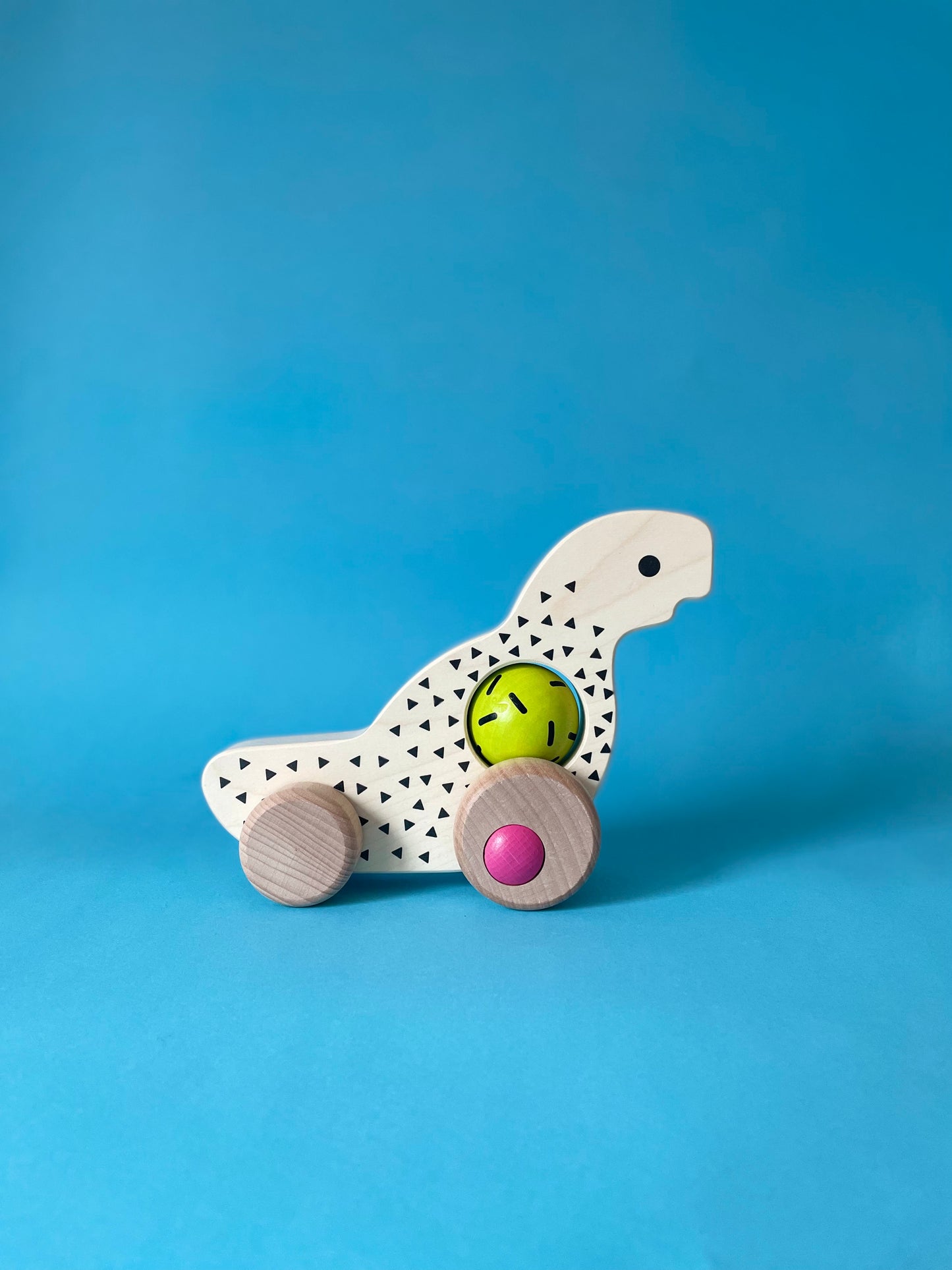 Дървена детска играчка Динозавър с колелца - BAJO